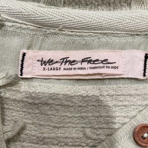 Adorable lime green pullover with a hood.